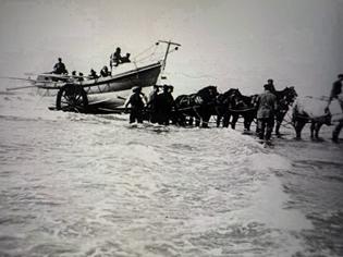 horses pulling lifeboat